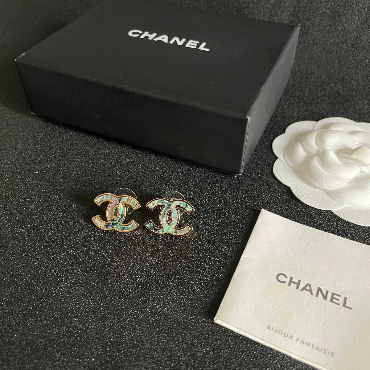 Double-C Emblem Stud Earrings in Polished Metal-Tone – Design 301 close-up detail