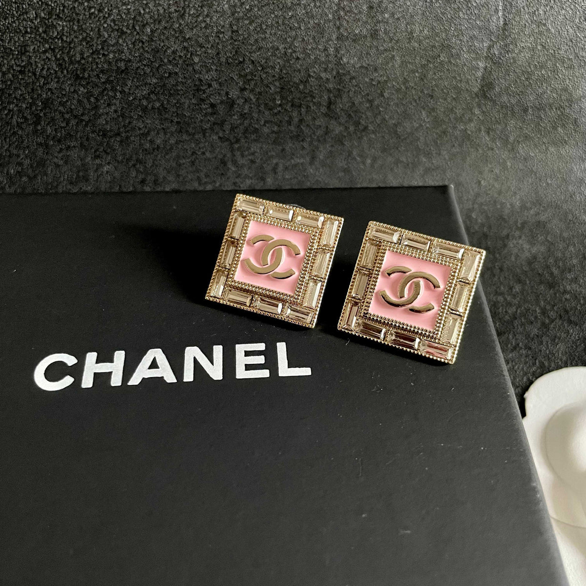 Double-C Emblem Stud Earrings in Polished Metal-Tone – Design 428 detail view