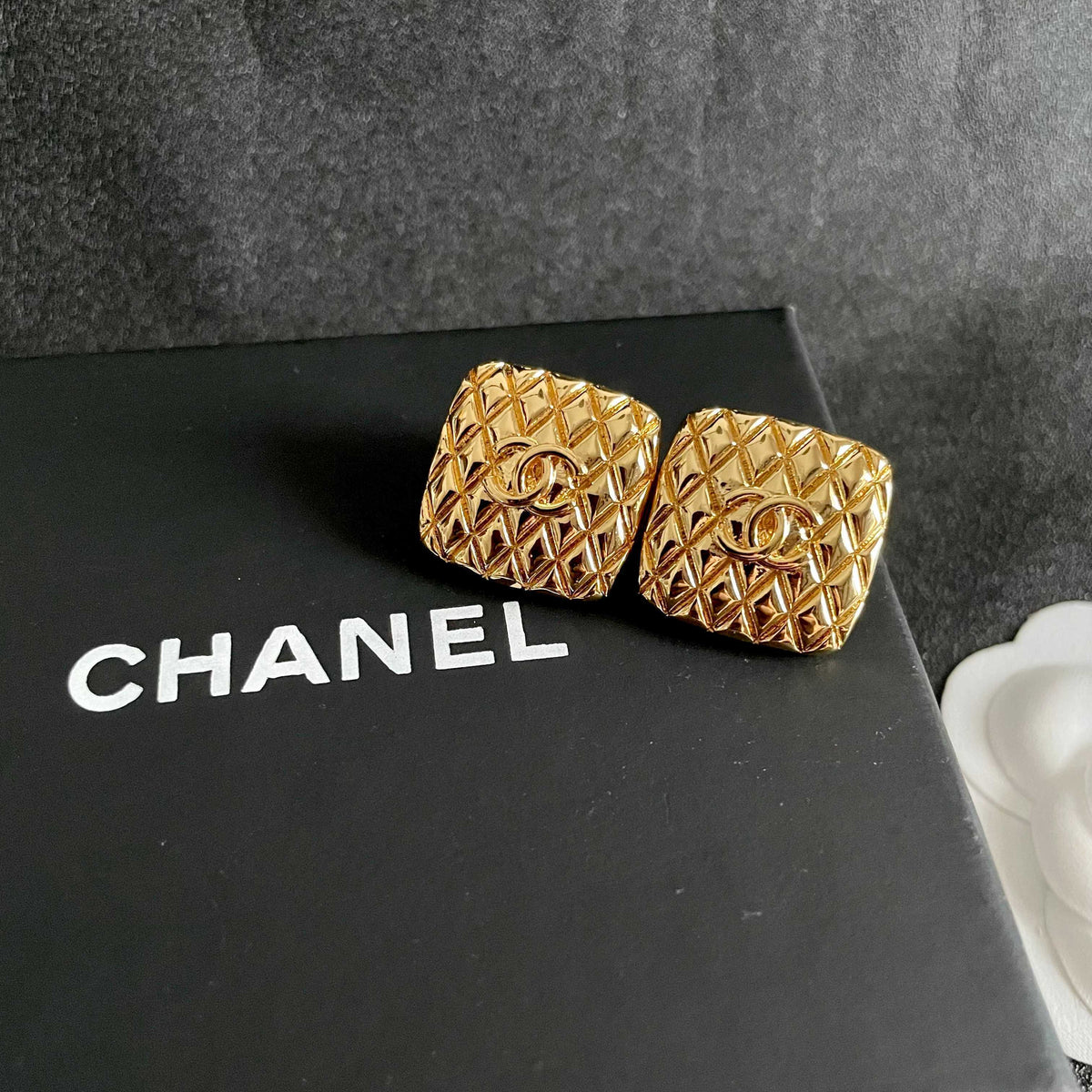 Double-C Emblem Stud Earrings in Polished Metal-Tone – Design 398 detail view