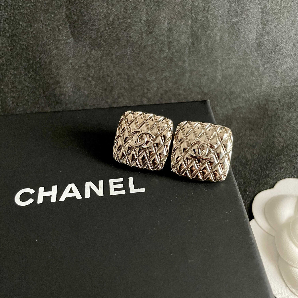 Double-C Emblem Stud Earrings in Polished Metal-Tone – Design 425 detail view