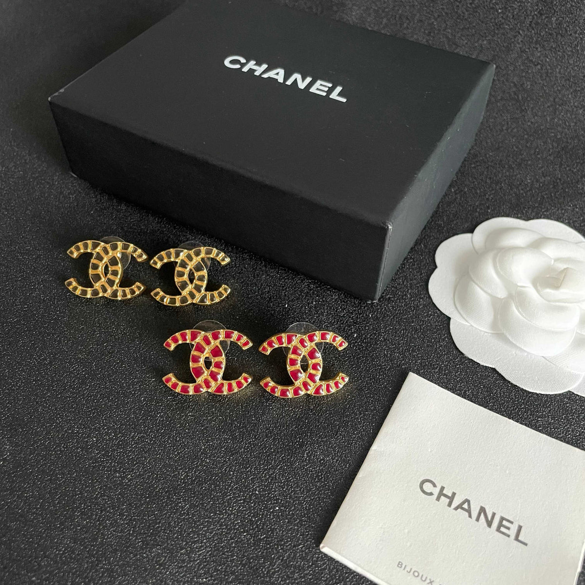 Double-C Emblem Stud Earrings in Polished Metal-Tone – Design 422 close-up detail