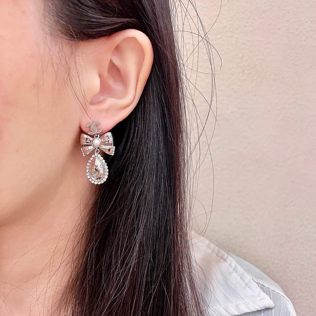 Signature Emblem Stud Earrings in Polished Metal-Tone – Design 118 detail view