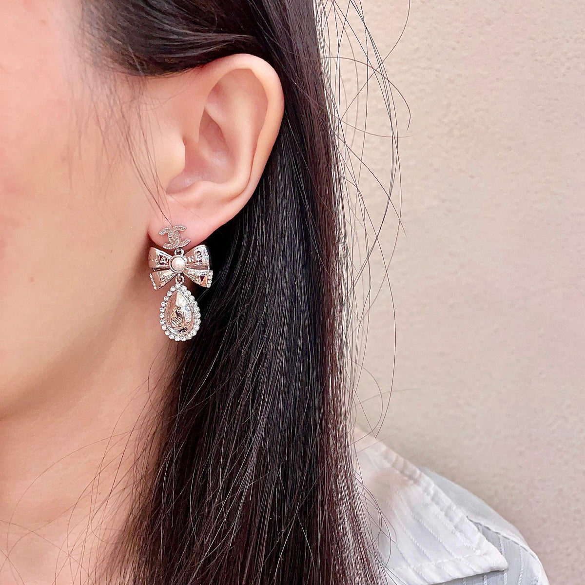 Signature Emblem Stud Earrings in Polished Metal-Tone – Design 118 detail view