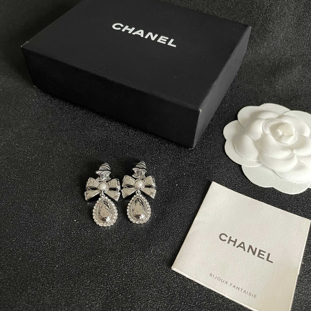 Signature Emblem Stud Earrings in Polished Metal-Tone – Design 118 close-up detail