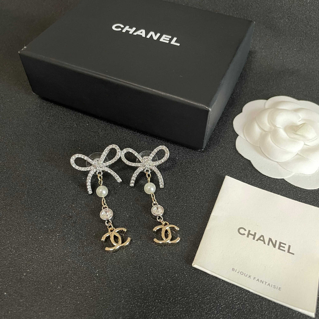 Double-C Emblem Stud Earrings in Polished Metal-Tone – Design 451 close-up detail