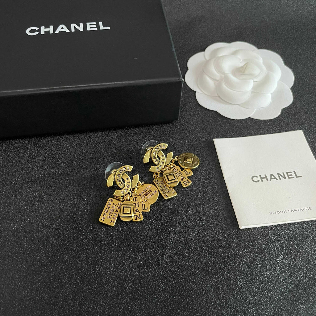 Double-C Emblem Stud Earrings in Polished Metal-Tone – Design 450 styled product view