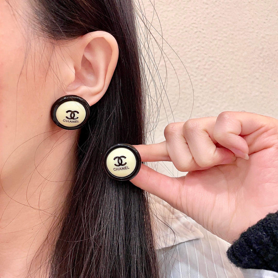 Double-C Emblem Stud Earrings in Polished Metal-Tone – Design 448 main product view