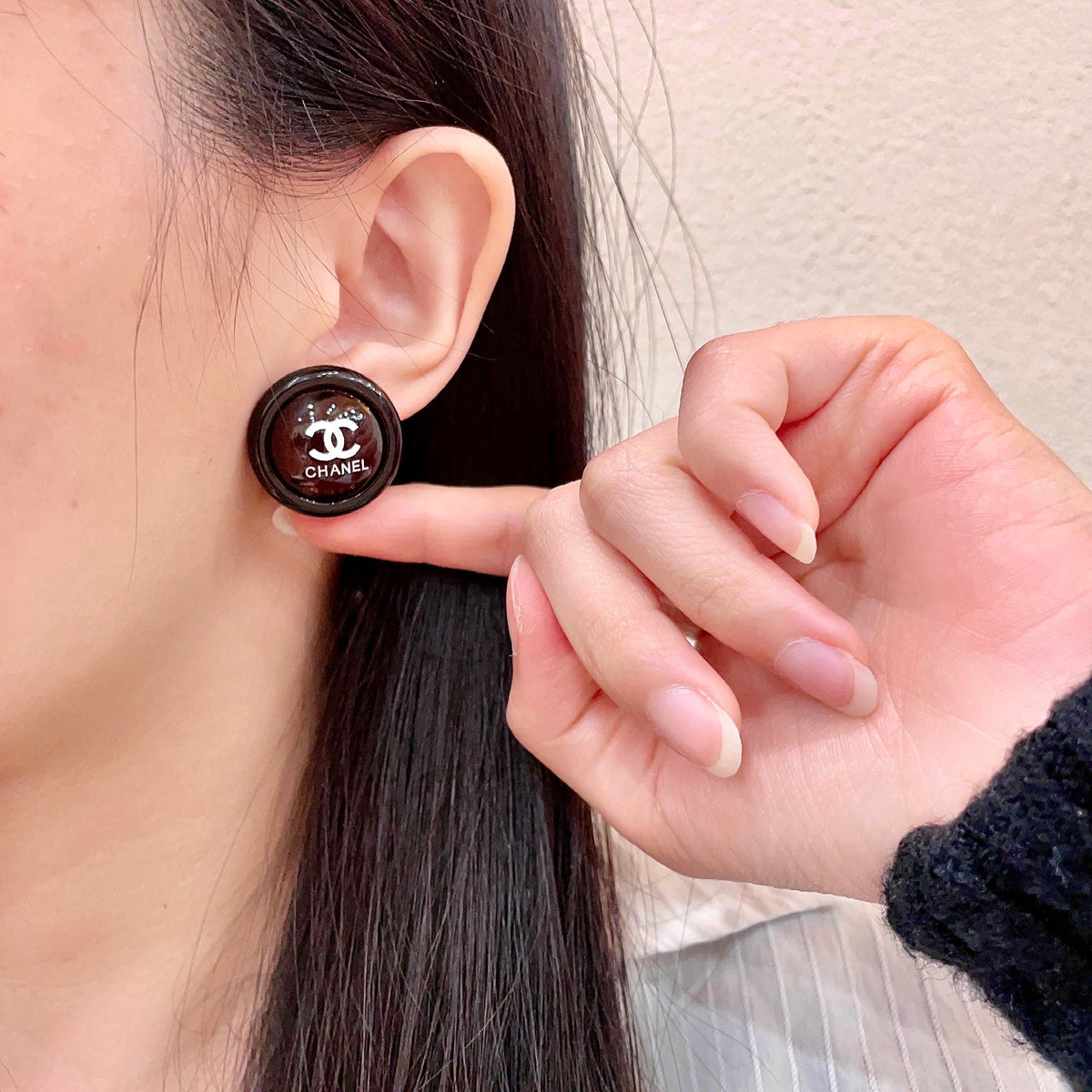 Double-C Emblem Stud Earrings in Polished Metal-Tone – Design 447 front product view