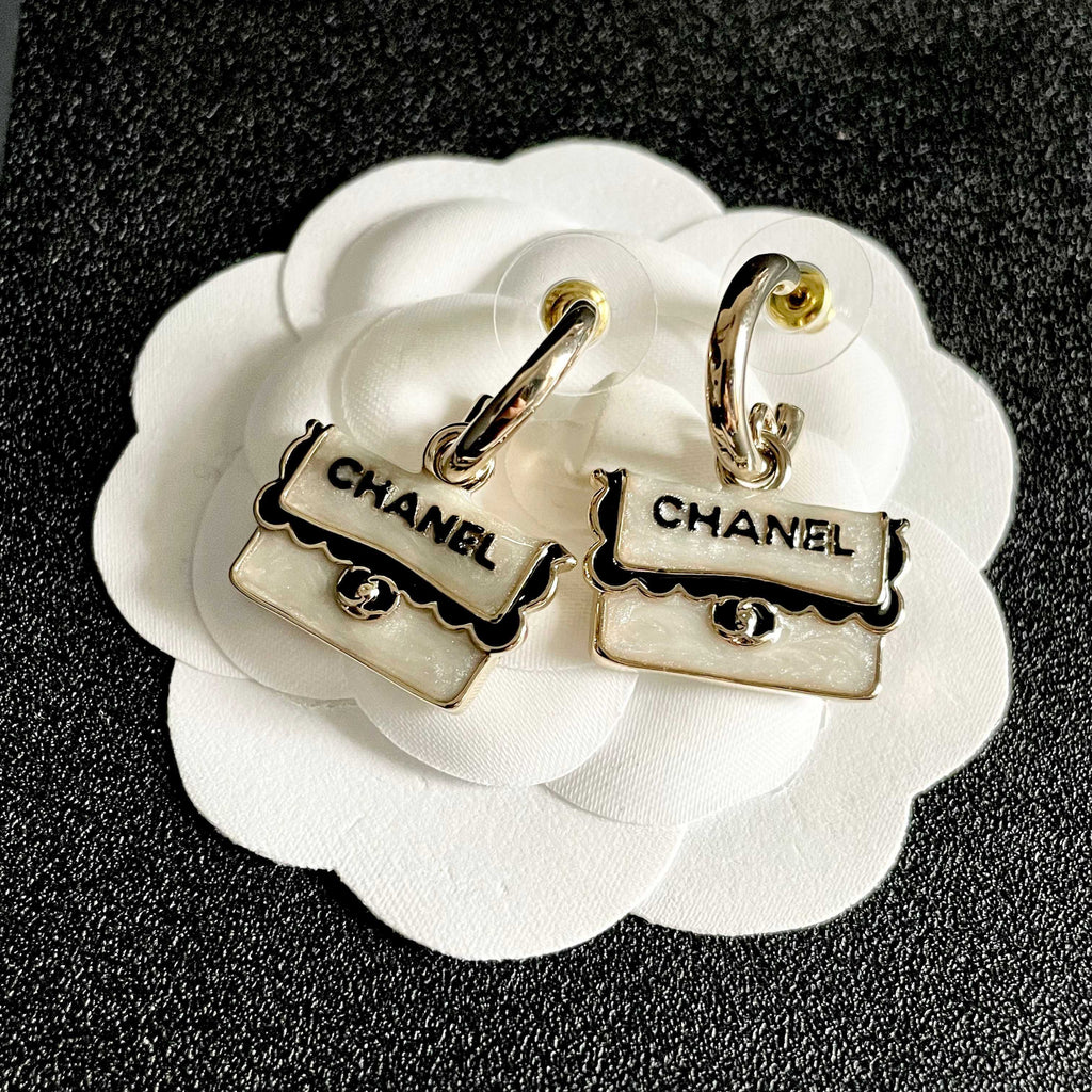 Double-C Emblem Stud Earrings in Polished Metal-Tone – Design 445 front product view
