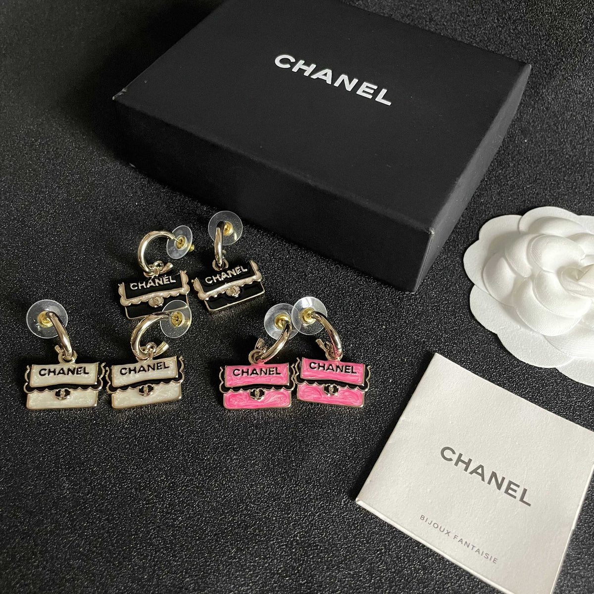 Double-C Emblem Stud Earrings in Polished Metal-Tone – Design 443 close-up detail