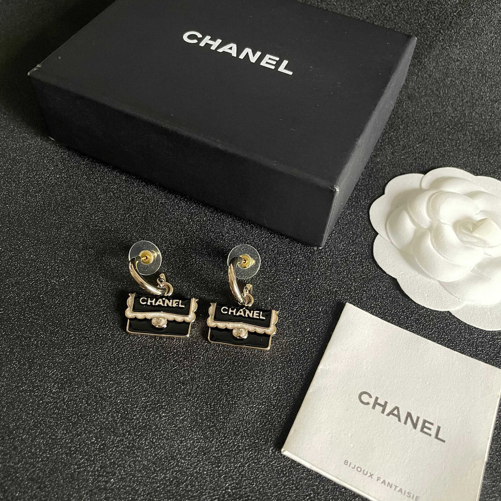 Double-C Emblem Stud Earrings in Polished Metal-Tone – Design 444 close-up detail