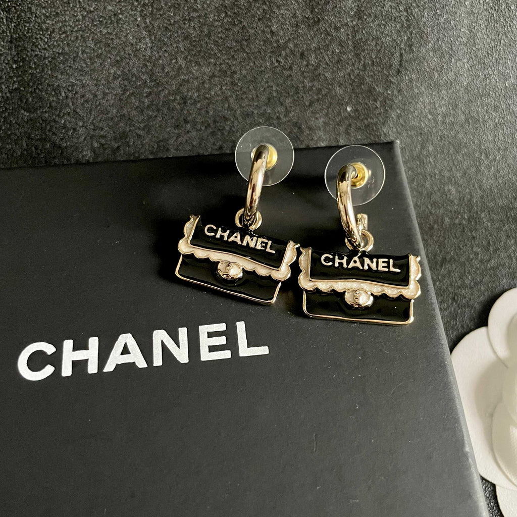 Double-C Emblem Stud Earrings in Polished Metal-Tone – Design 444 detail view