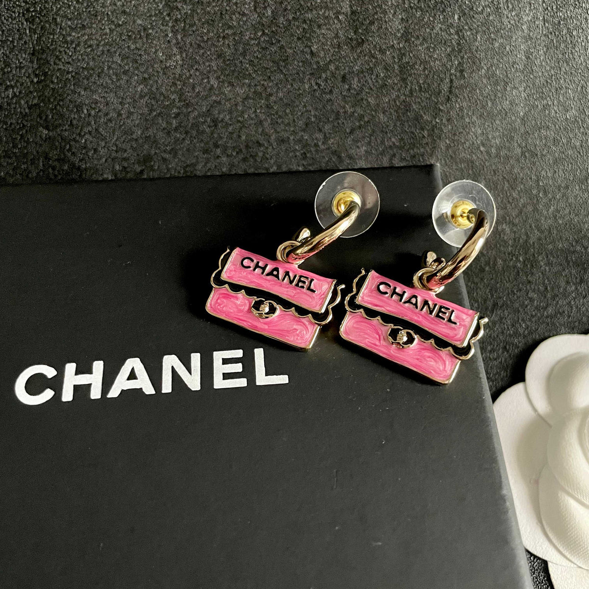 Double-C Emblem Stud Earrings in Polished Metal-Tone – Design 443 detail view