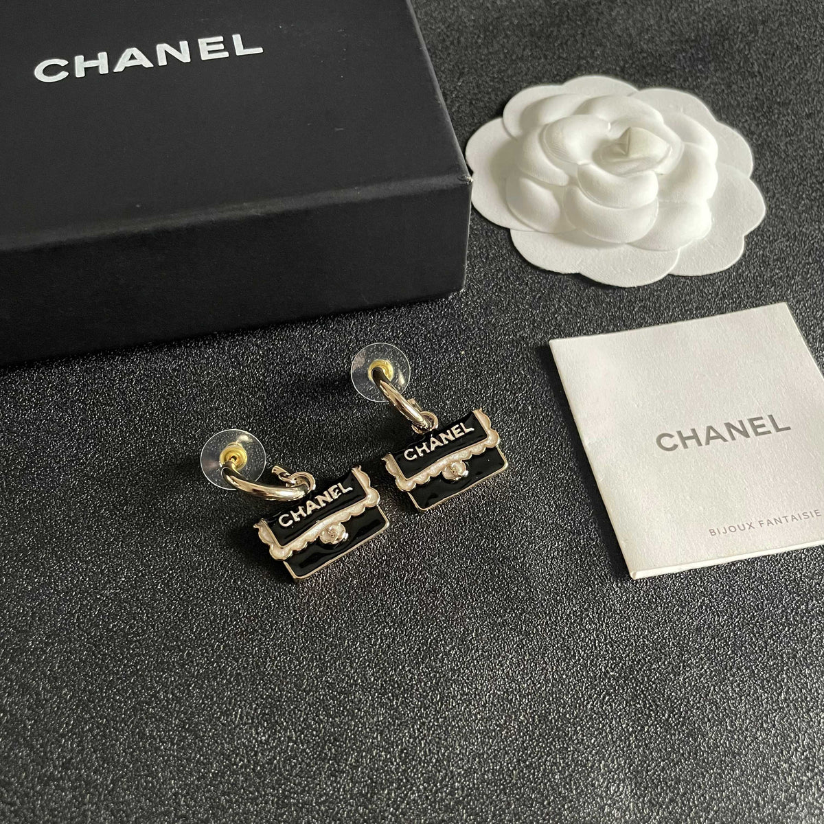 Double-C Emblem Stud Earrings in Polished Metal-Tone – Design 444 styled product view