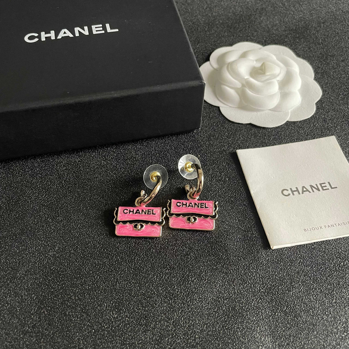 Double-C Emblem Stud Earrings in Polished Metal-Tone – Design 443 styled product view