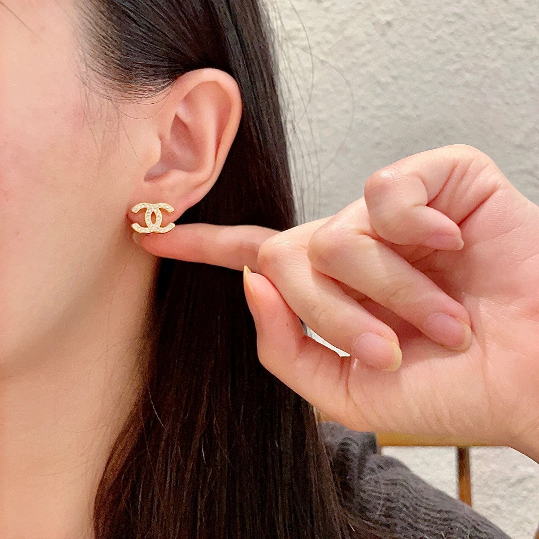 Double-C Emblem Stud Earrings in Polished Metal-Tone – Design 442 front product view