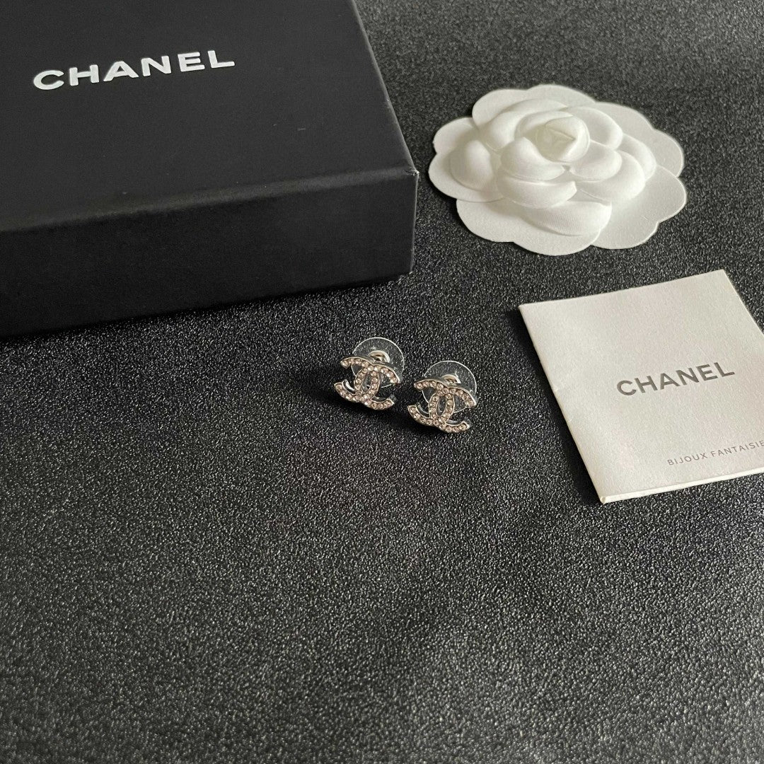 Double-C Emblem Stud Earrings in Polished Metal-Tone – Design 441 styled product view