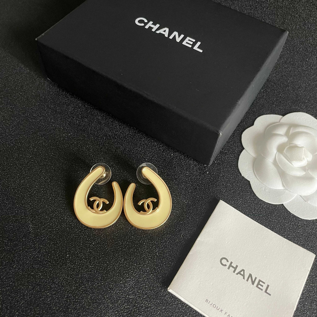 Double-C Emblem Stud Earrings in Polished Metal-Tone – Design 460 close-up detail