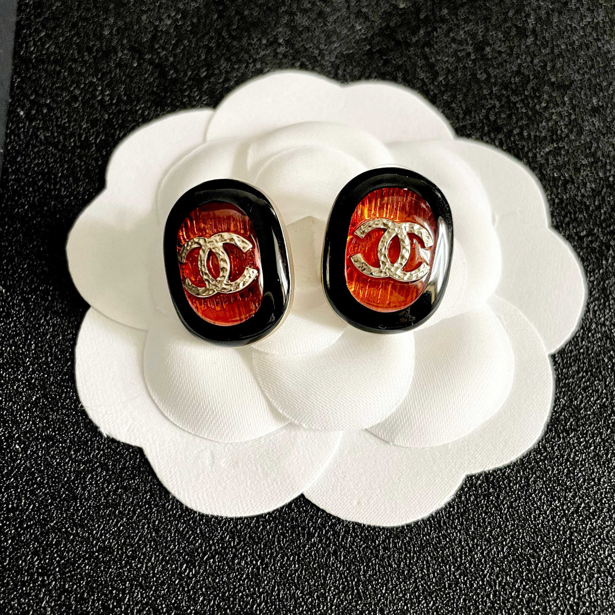 Double-C Emblem Stud Earrings in Polished Metal-Tone – Design 458 front product view