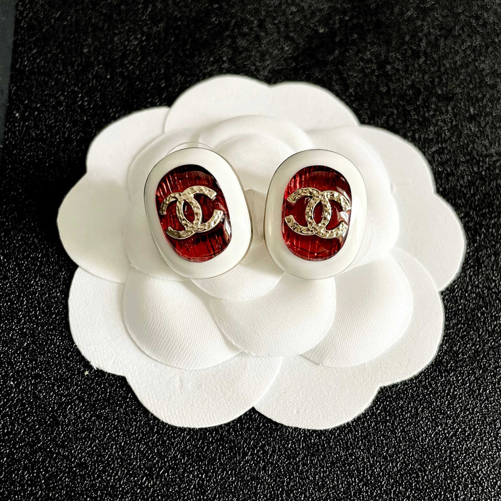 Double-C Emblem Stud Earrings in Polished Metal-Tone – Design 417 front product view