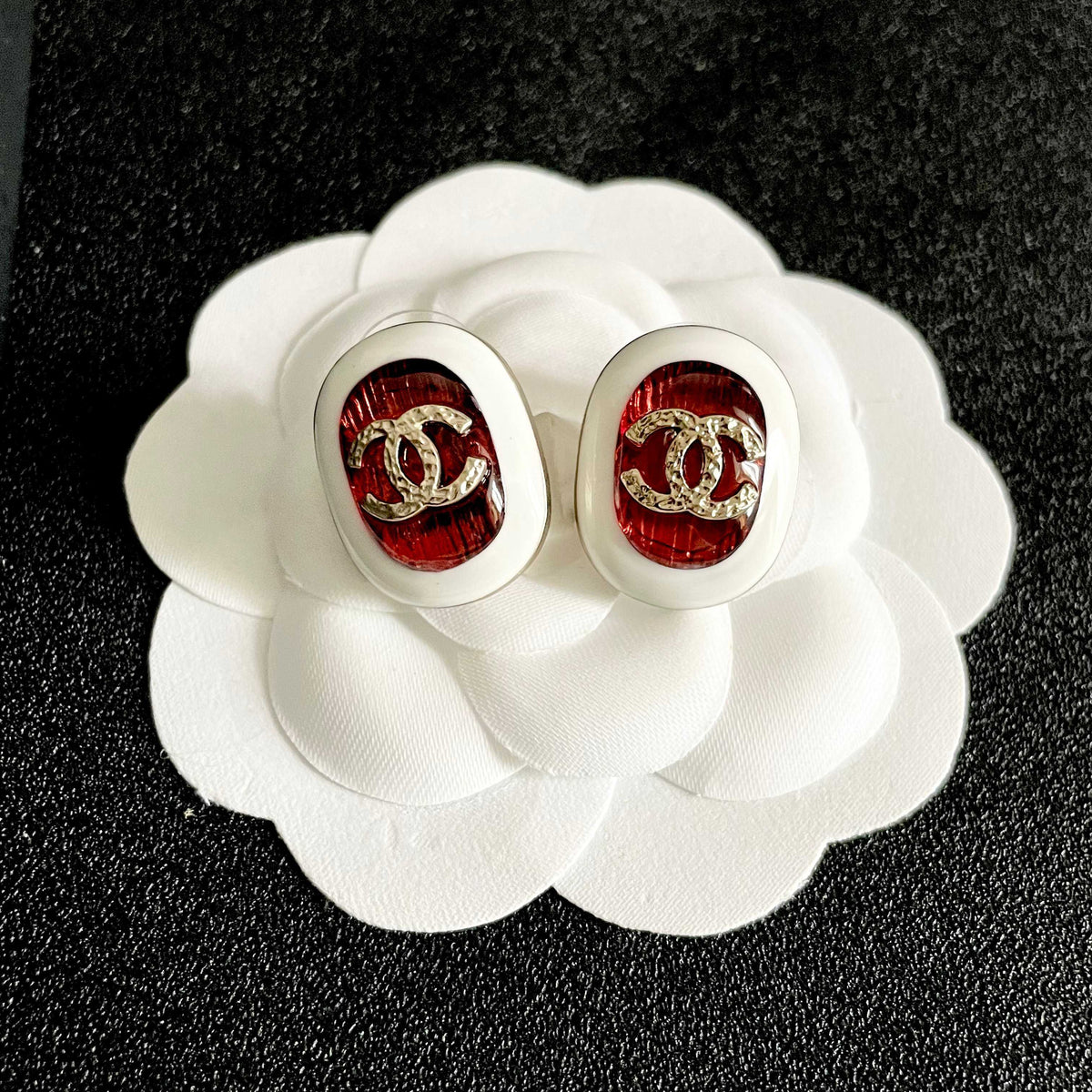 Double-C Emblem Stud Earrings in Polished Metal-Tone – Design 457 front product view