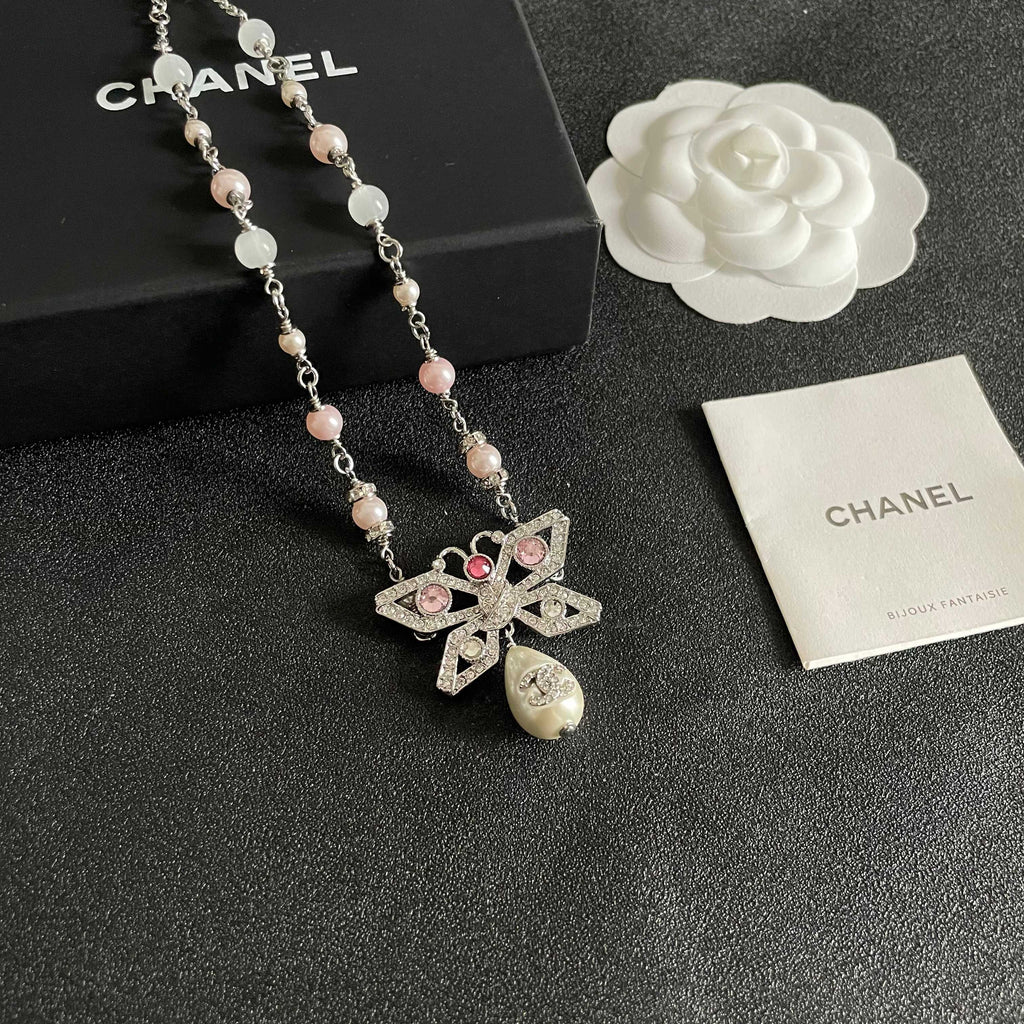 Double-C Emblem Pearl-Detail Pendant Necklace – Pearl Detail – Design 128 styled product view