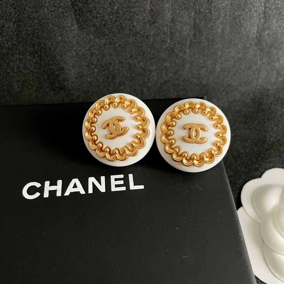 Double-C Emblem Stud Earrings in Polished Metal-Tone – Design 478 detail view