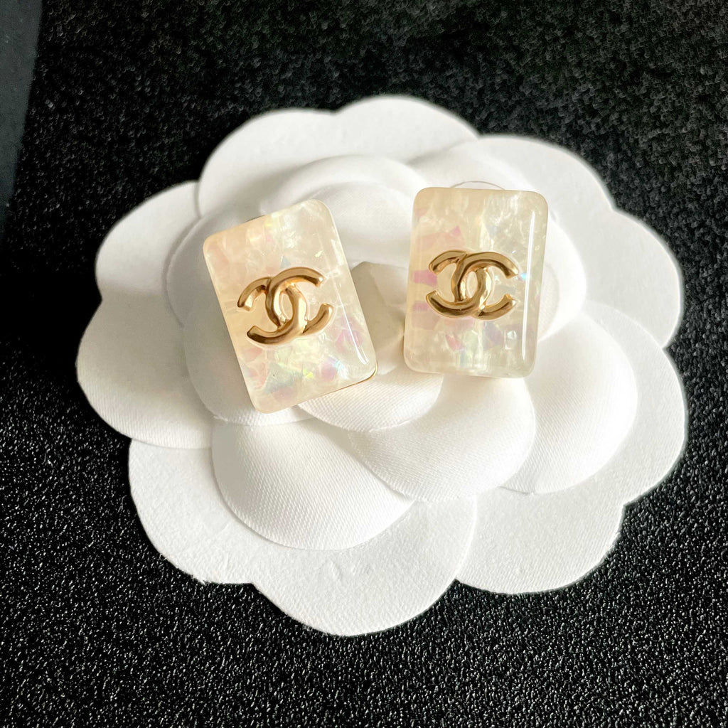 Double-C Emblem Stud Earrings in Polished Metal-Tone – Design 477 front product view