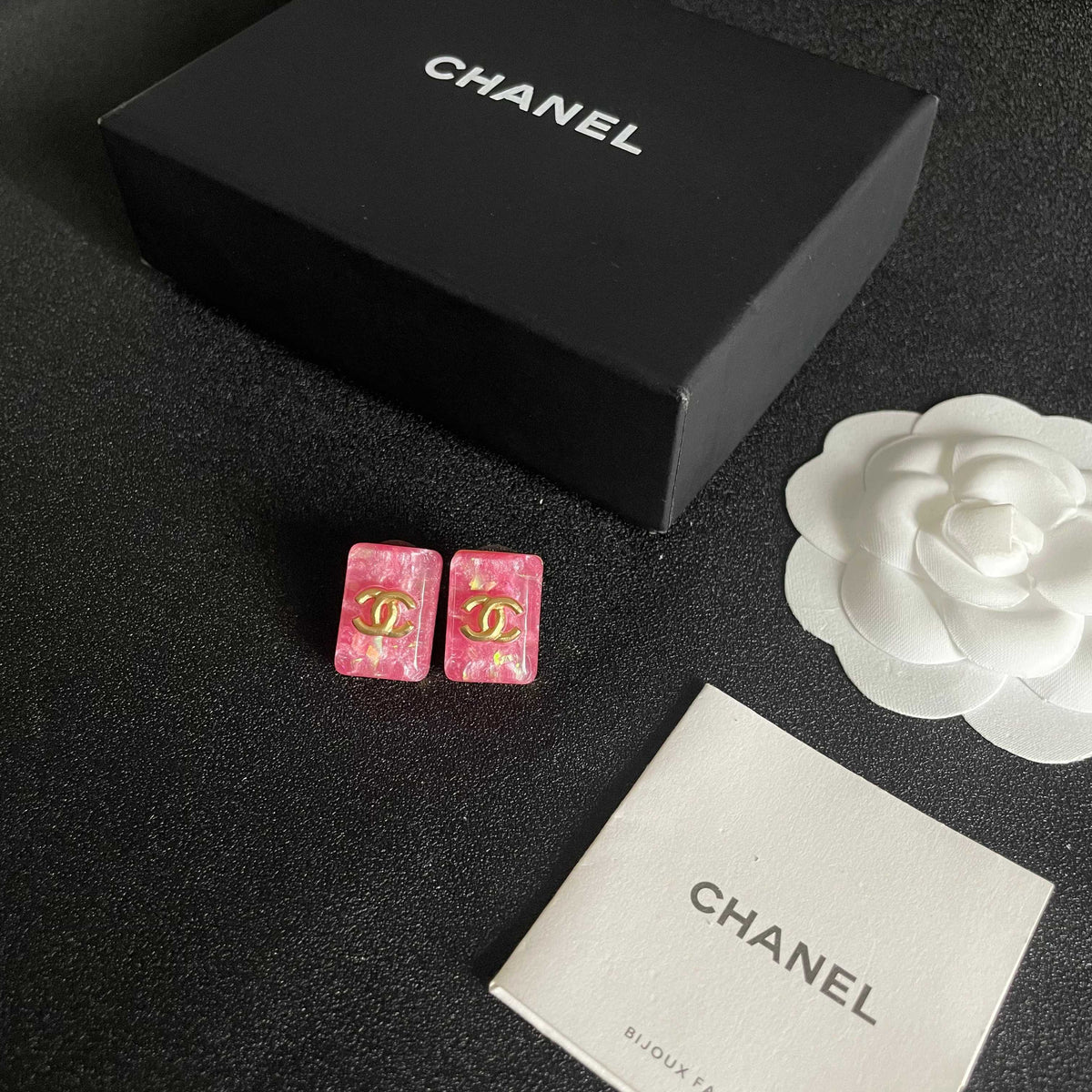 Double-C Emblem Stud Earrings in Polished Metal-Tone – Design 409 close-up detail
