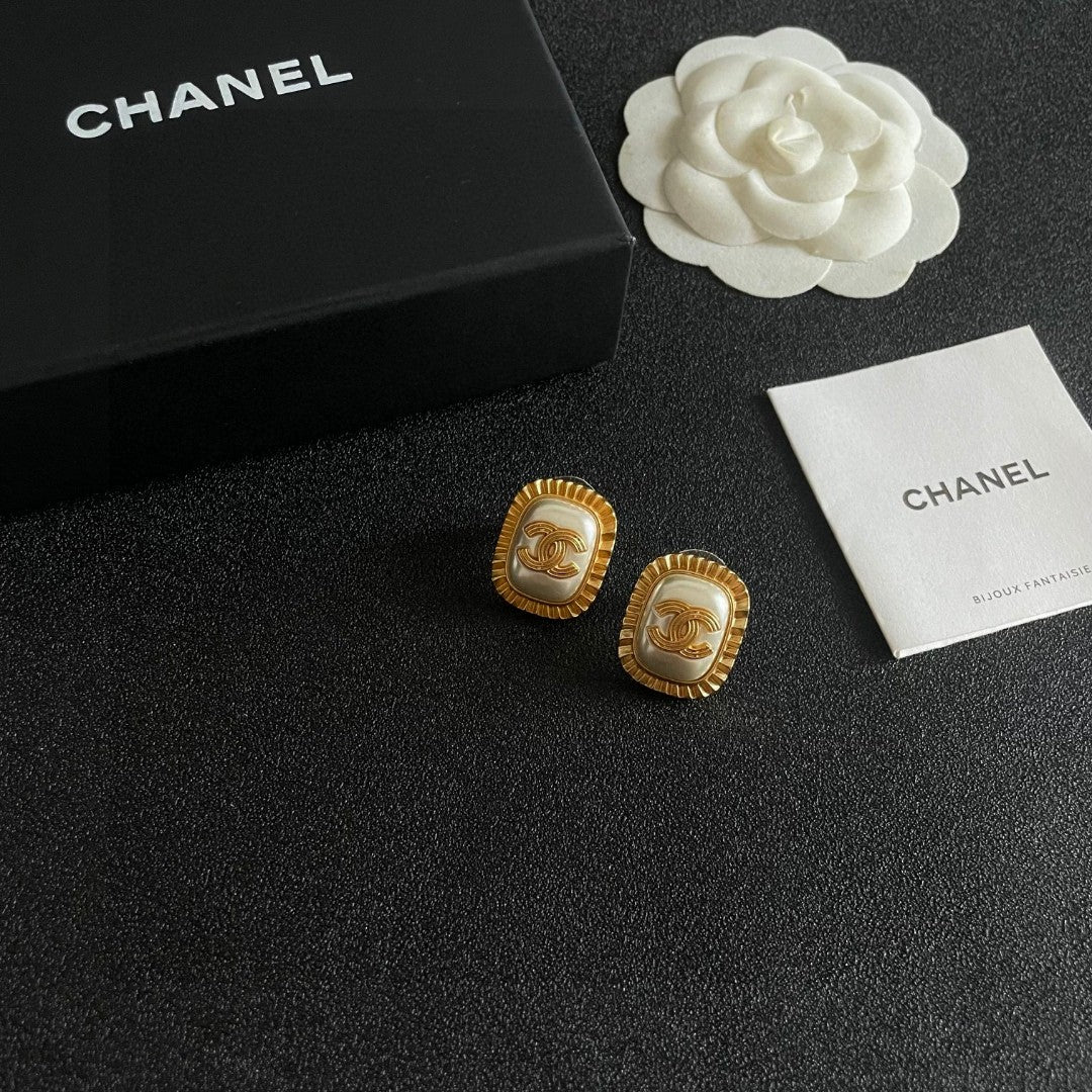 Double-C Emblem Stud Earrings in Polished Metal-Tone – Design 434 styled product view