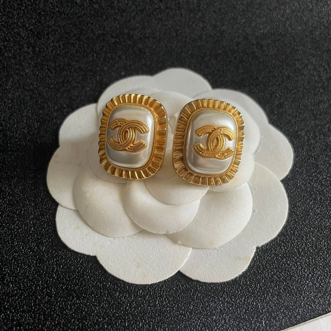 Double-C Emblem Stud Earrings in Polished Metal-Tone – Design 434 front product view