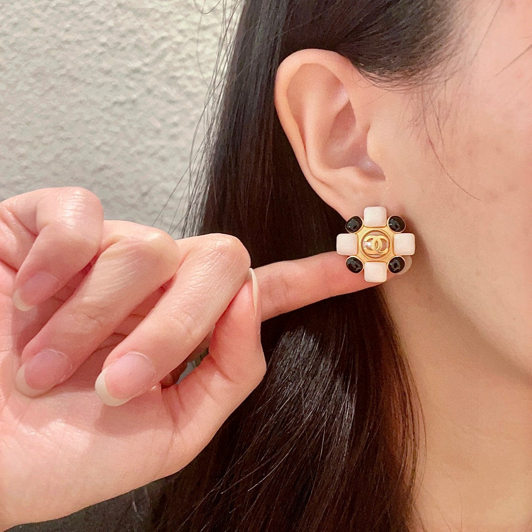 Double-C Emblem Stud Earrings in Polished Metal-Tone – Design 433 front product view