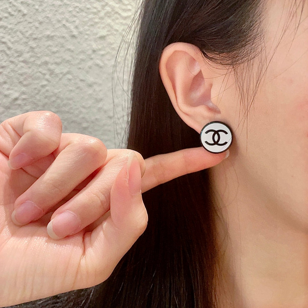 Double-C Emblem Stud Earrings in Polished Metal-Tone – Design 470 front product view