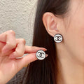 Double-C Emblem Stud Earrings in Polished Metal-Tone – Design 470 main product view