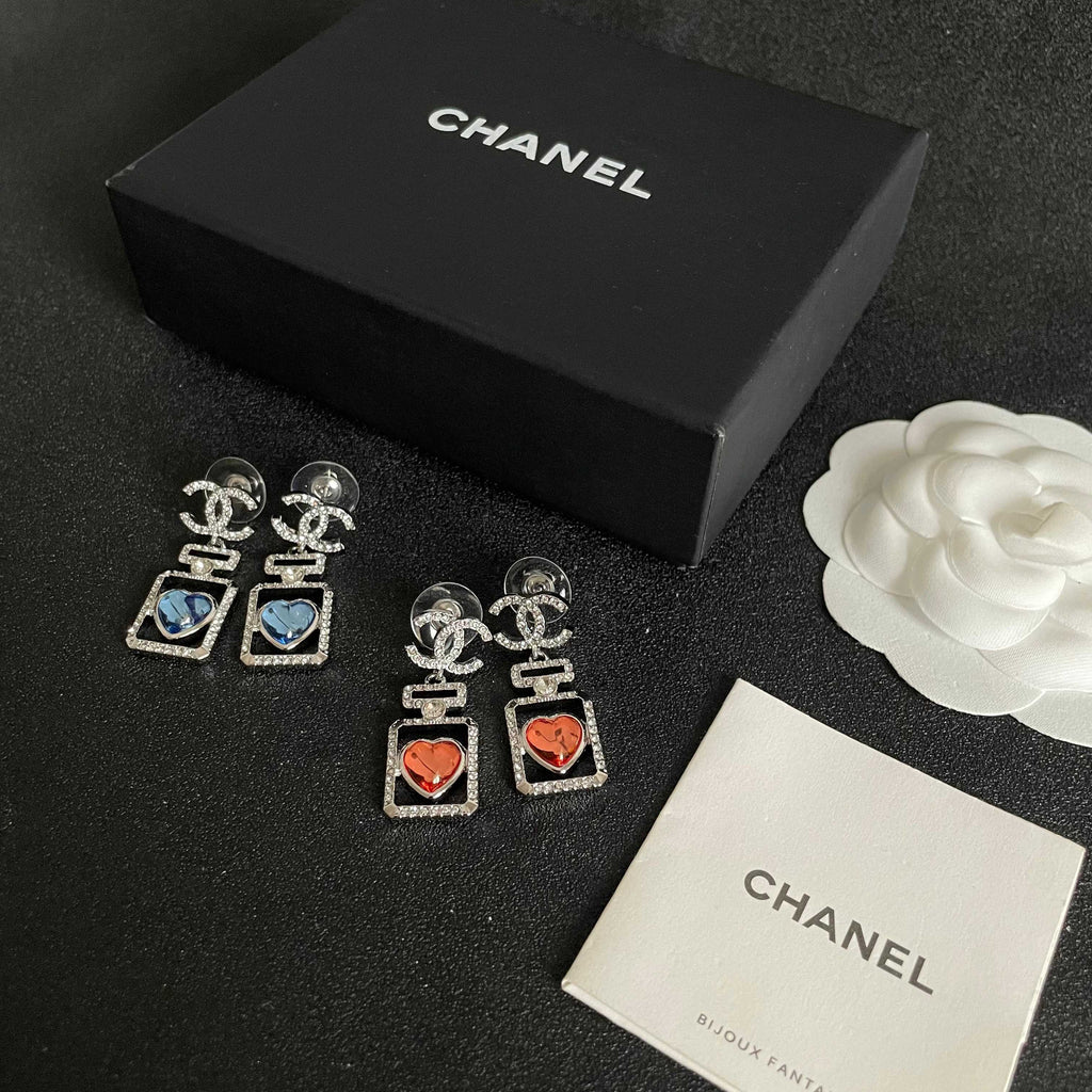 Double-C Emblem Statement Earrings in Polished Metal-Tone – Heart Detail – Design 007 close-up detail