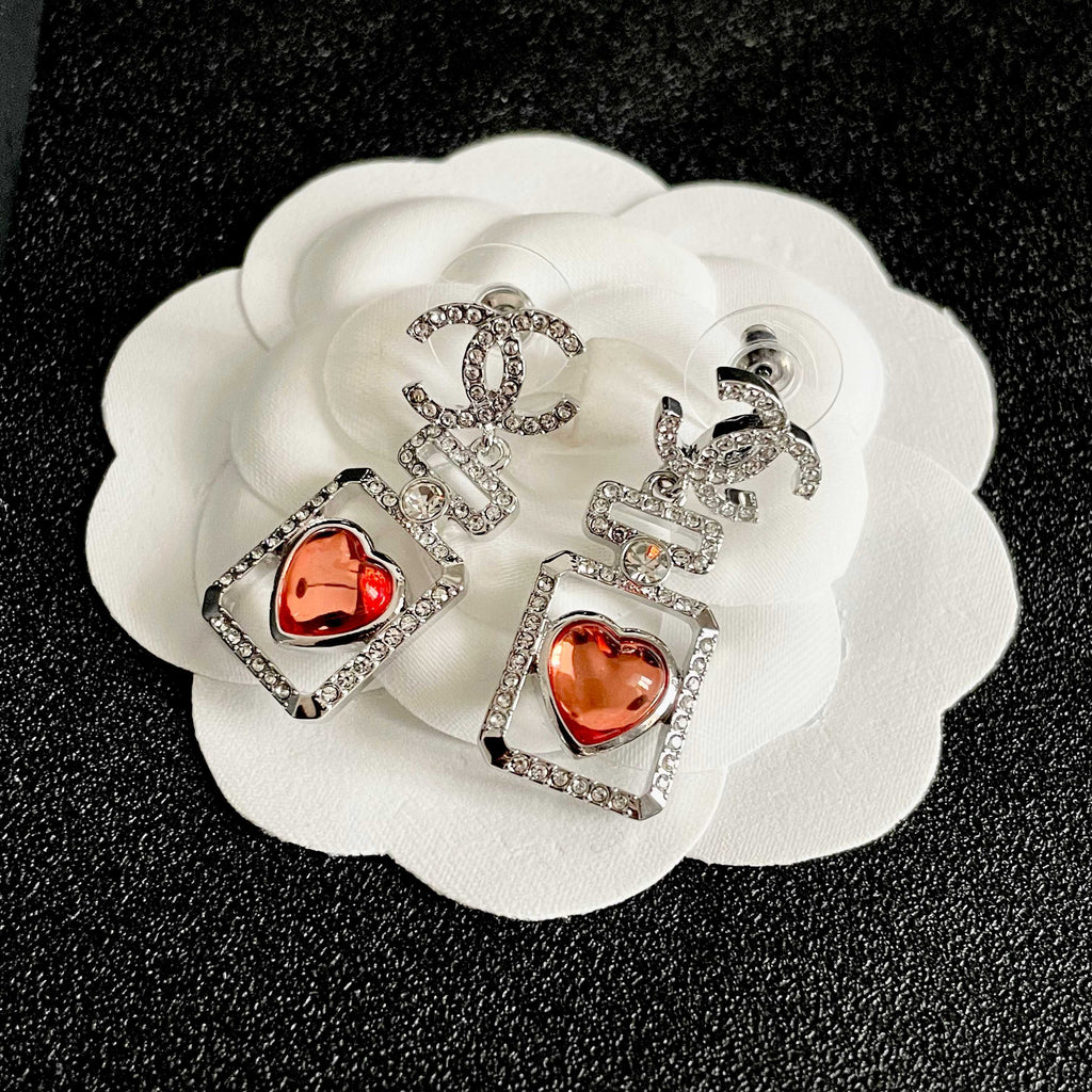 Double-C Emblem Statement Earrings in Polished Metal-Tone – Heart Detail – Design 007 front product view