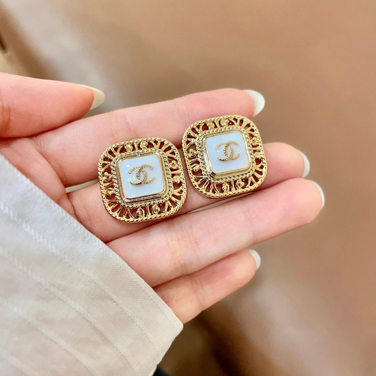 Double-C Emblem Stud Earrings in Polished Metal-Tone – Design 139 side detail