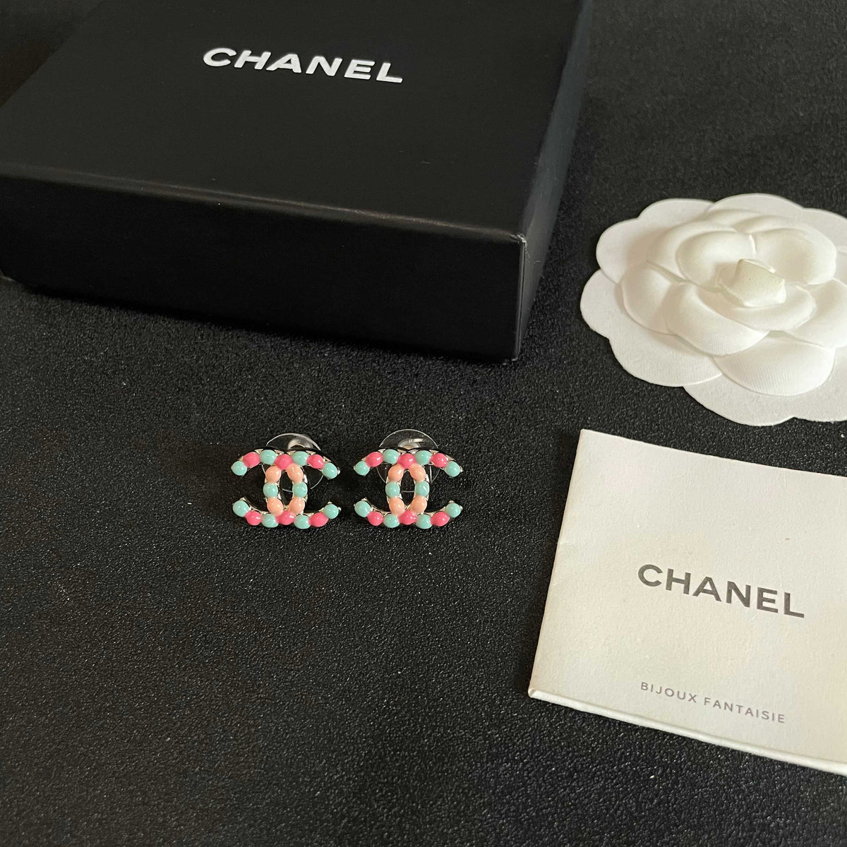 Double-C Emblem Stud Earrings in Polished Metal-Tone – Design 136 close-up detail