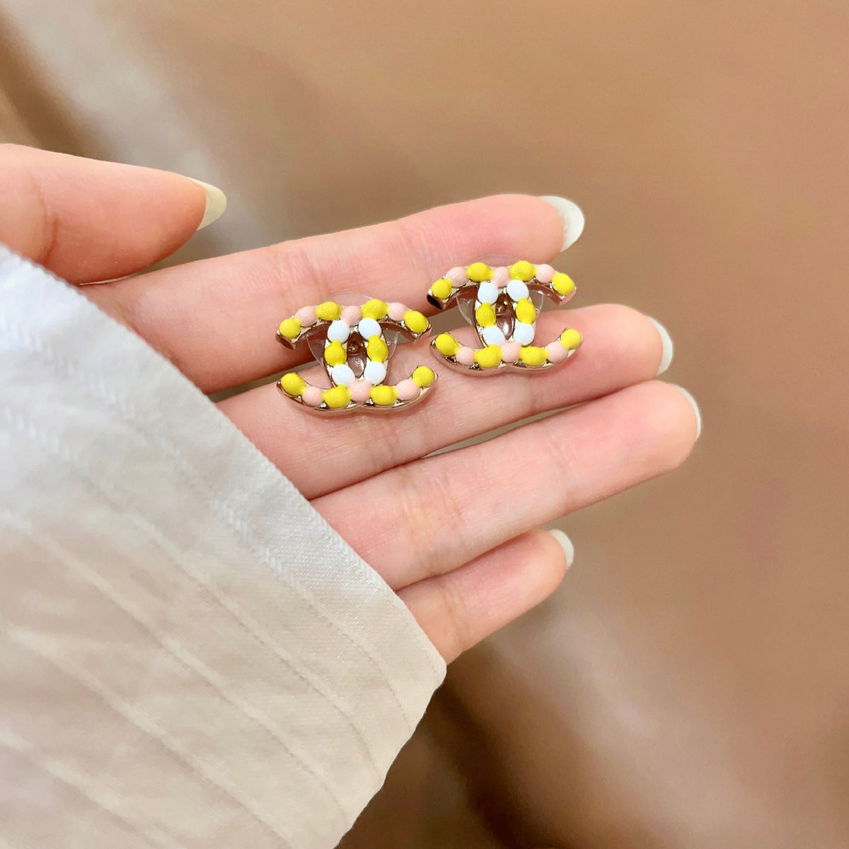 Double-C Emblem Stud Earrings in Polished Metal-Tone – Design 135 side detail