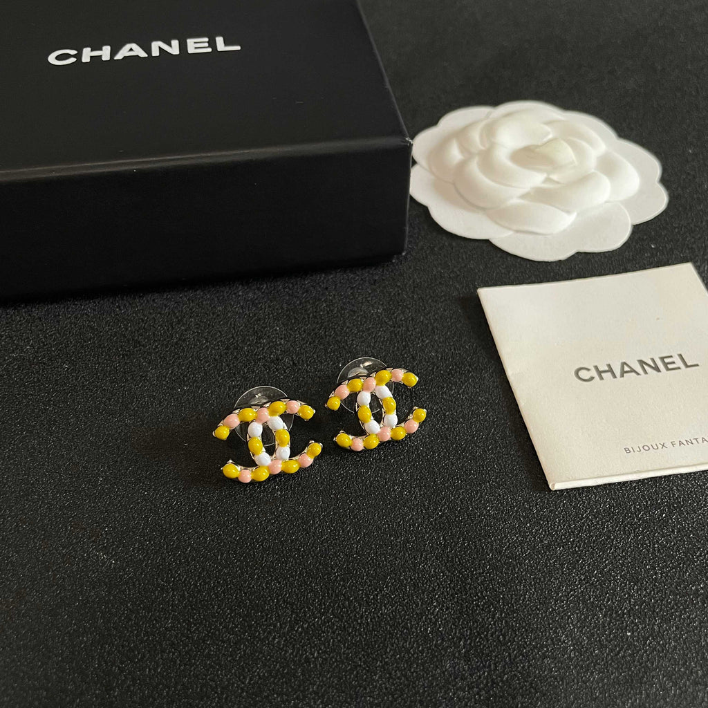 Double-C Emblem Stud Earrings in Polished Metal-Tone – Design 135 styled product view