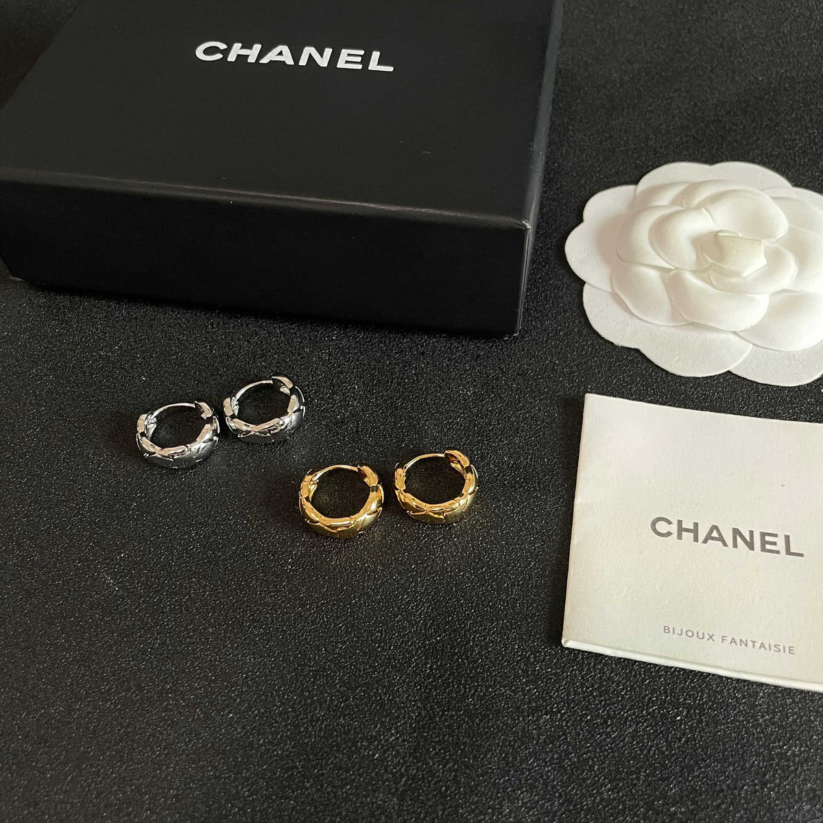 Double-C Emblem Stud Earrings in Polished Metal-Tone – Design 129 close-up detail