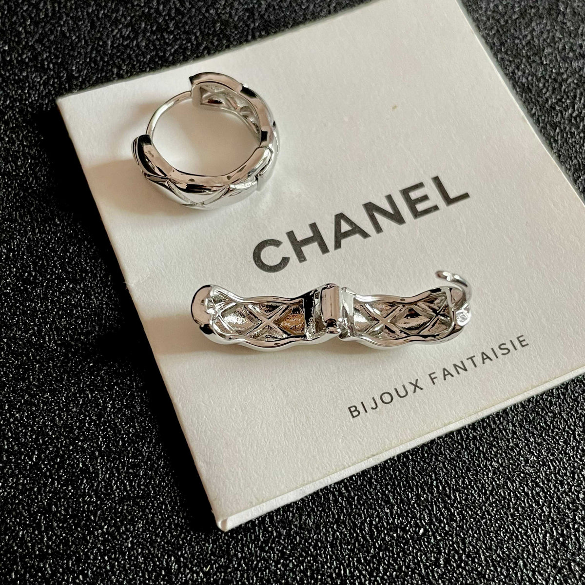 Double-C Emblem Stud Earrings in Polished Metal-Tone – Design 130 main product view