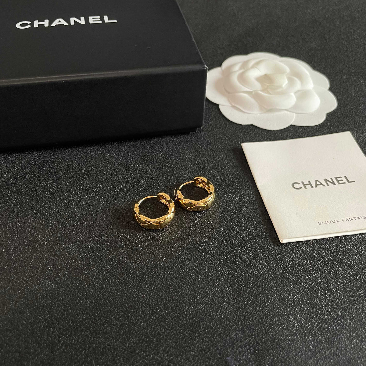 Double-C Emblem Stud Earrings in Polished Metal-Tone – Design 129 styled product view