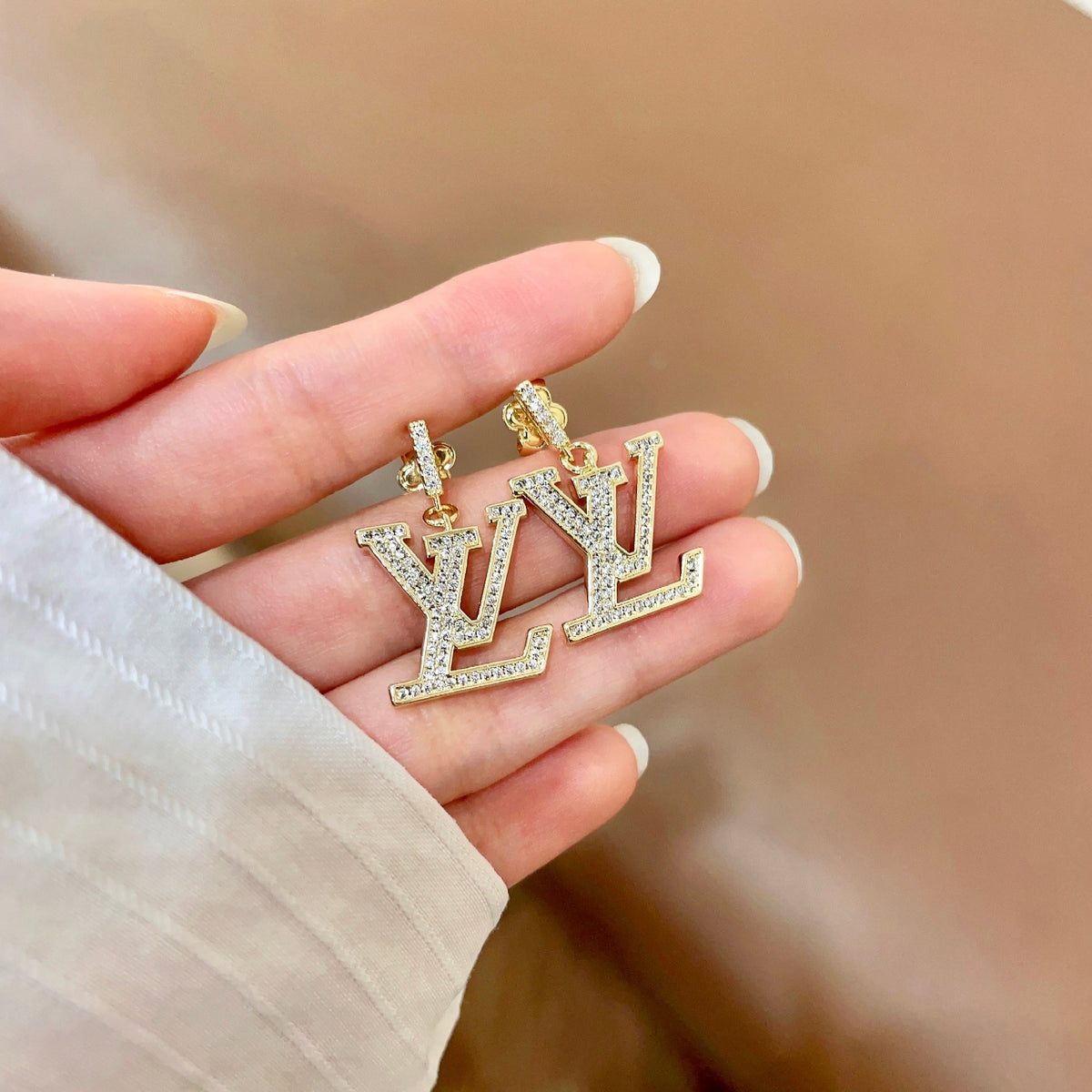 Geometric Emblem Stud Earrings in Polished Metal-Tone – Design 007 side detail