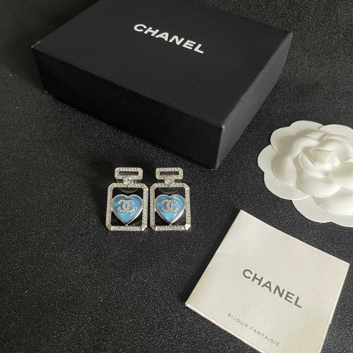 Double-C Emblem Stud Earrings in Polished Metal-Tone – Heart Detail – Design 003 close-up detail
