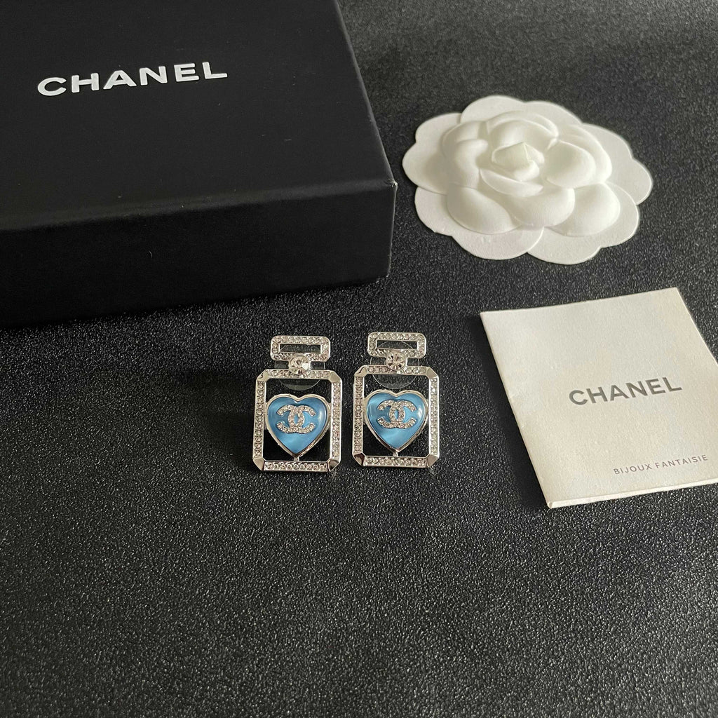Double-C Emblem Stud Earrings in Polished Metal-Tone – Heart Detail – Design 003 styled product view