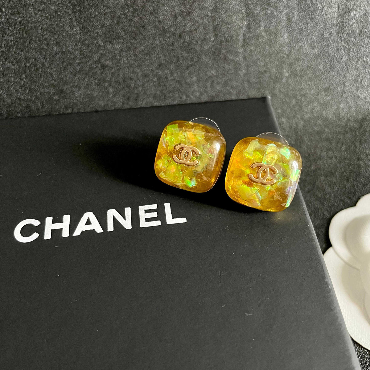 Double-C Emblem Stud Earrings in Polished Metal-Tone – Design 118 detail view