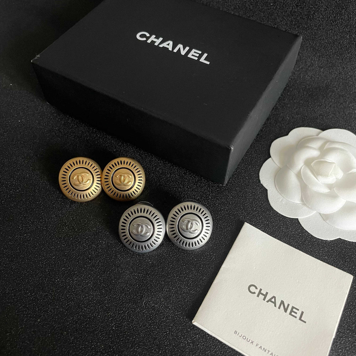 Double-C Emblem Stud Earrings in Polished Metal-Tone – Design 099 close-up detail