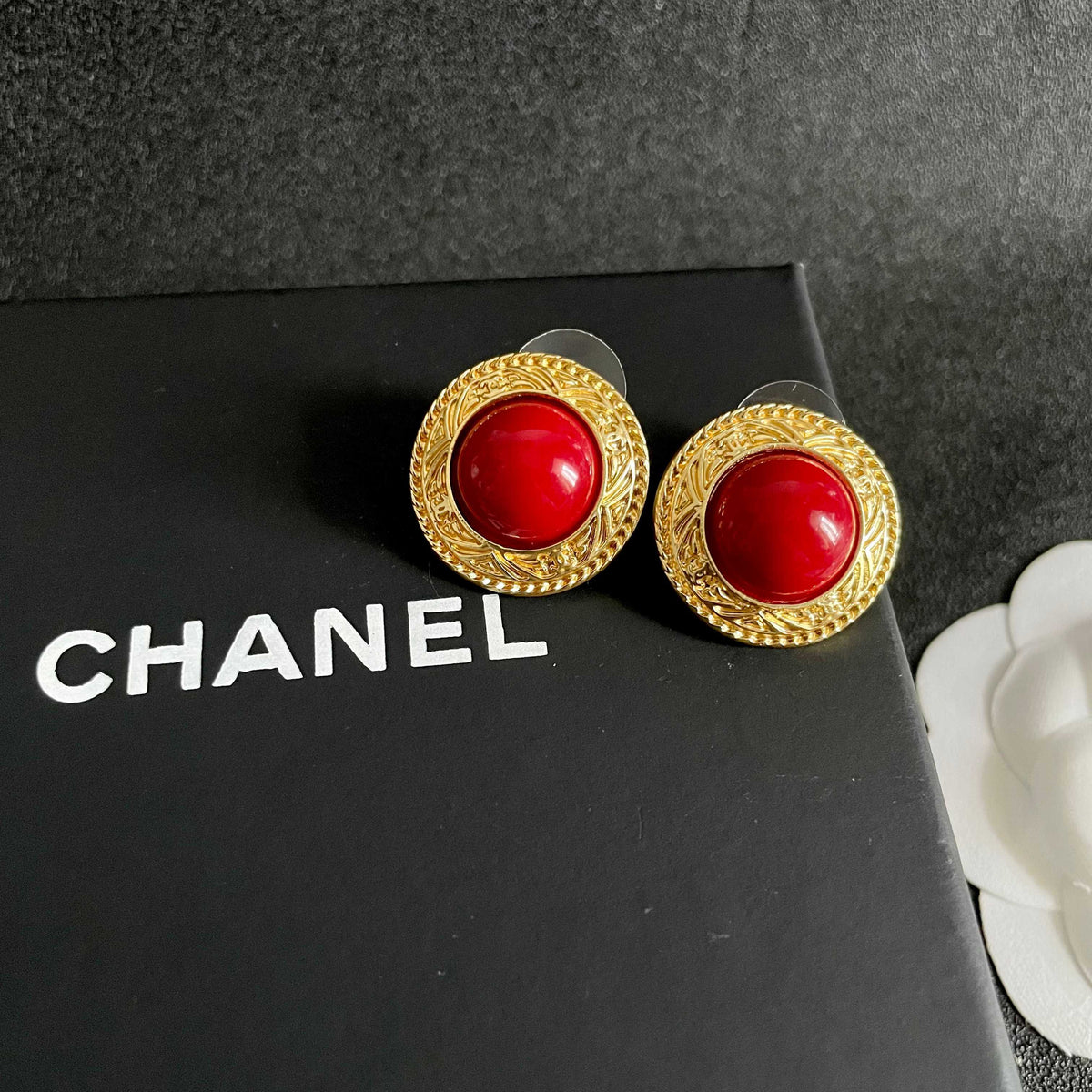 Double-C Emblem Stud Earrings in Polished Metal-Tone – Design 112 detail view