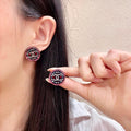 Double-C Emblem Stud Earrings in Polished Metal-Tone – Design 092 main product view